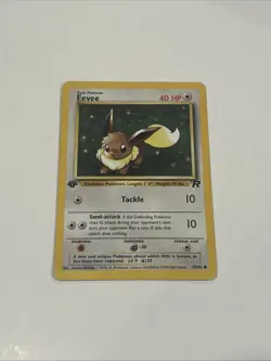 POKEMON EEVEE 55/82 1ST EDITION TEAM ROCKET LP-NM - Image 1
