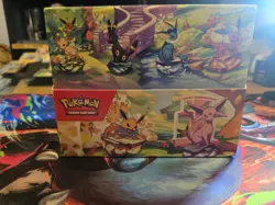 Pokemon Prismatic Evolutions Tin Display Coins and art inserts-No packs - Image 1