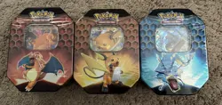 Pokemon Hidden Fates GX Tins Art Set of 3 Sealed Charizard Raichu Gyarados - Image 1
