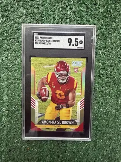 2021 Panini Score Amon-Ra St. Brown RC Gold Zone Rookie #/50 Trojans SGC 9.5 - Image 1