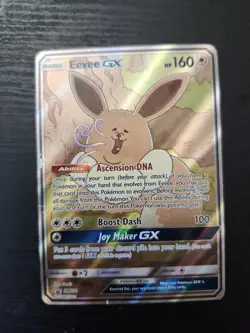 Pokemon TCG Eevee GX SM233 DAMAGED - Image 1