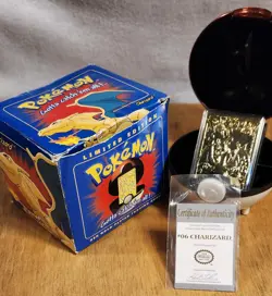 1999 BK Pokemon 23K Gold Plated Charizard with Authenticity Card Box Ball Case - Image 1