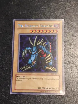 Yu-Gi-Oh SECRET RARE TRI-HORNED DRAGON LOB-000 1996 KAZUKI TAKAHASHI NM/VLP - Image 1