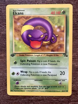 1st Edition Ekans 46/62 Fossil Set WOTC Vintage Pokemon Card Common NM - Image 1