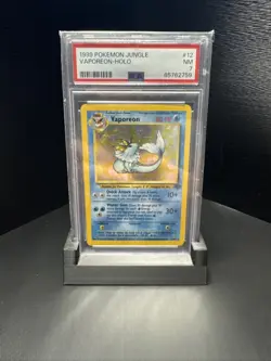 PSA 7 NM Vaporeon #12 Pokemon Jungle Holo WOTC - Image 1