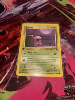 Pokemon TCG Grimer Fossil 1st Edition Common Card 48/62 NM/LP - Image 1