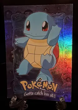 1999 Topps Pokemon the First Movie Rainbow Foil E7 #07 Squirtle Blue Logo Holo - Image 1