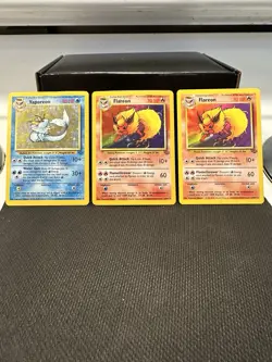 Pokemon TCG Flareon 19/64 Holo MP - Flareon 19/64 Non-Holo NM -Vaporeon 12/64 LP - Image 1