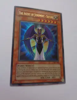 The Agent of Judgment - Saturn AST-006 (Ultra Rare, Unlimited, Near MInt / NM) - Image 1
