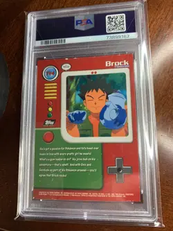 1999 Topps Pokemon #TV4 Brock Rainbow Foil Black Logo PSA 7 NM - Image 2