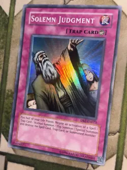 YuGiOh SOLEMN JUDGMENT Super Rare DB2-EN073 - Image 1