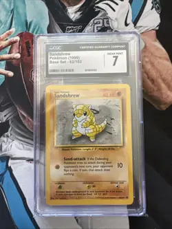 1999 Pokemon Sandshrew Base Set #62/102 CGC 7 - Image 1