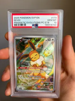 2025 POKEMON PRISMATIC EVOLUTIONS POKEMON CENTER ETB PROMO SVP #173 EEVEE PSA 10 - Image 1