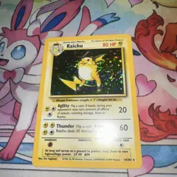 Vintage Base Set 14/102 Holo Raichu Rare Pokemon Card WOTC - Image 1