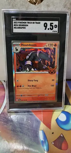 Houndoom Trick or Trade Booster 2023 Holo Card 034/198 SGC 9.5 - Image 1