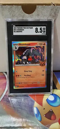 Houndoom Trick or Trade Booster 2023 Holo Card 034/198 - Image 1