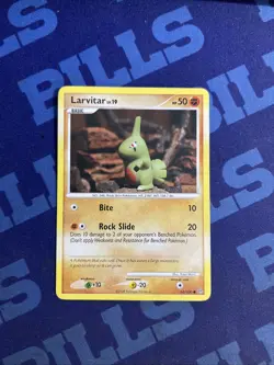Pokemon Larvitar 63/100 Stormfront LP Yuka Morii Artwork - Image 1
