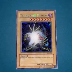 Tri-Horned Dragon LOB-000 Secret Rare MINT - YuGiOh - Image 1