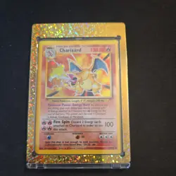 1999 Base Set Charizard Pokemon card (4/102) Poor Condition. - Image 1