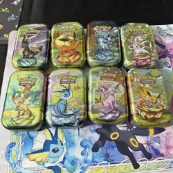 Set of 8 Prismatic Evolutions EMPTY Mini Tins With Pokemon Art Cards And Coins - Image 3
