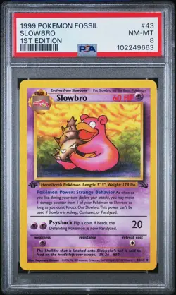 1999 POKEMON FOSSIL 1ST EDITION #43 SLOWBRO PSA 8 - Image 1