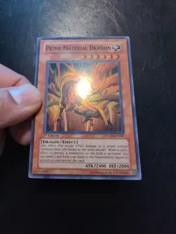 Yu-Gi-Oh! SUPER RARE HOLO CARD PRIME MATERIAL DRAGON PTDN-EN087 1ST LP - Image 2