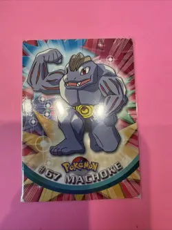 Machoke #67 Pokemon Topps Series 1 TCG Blue Logo Label 1st Print Pokemon - Image 1