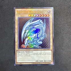 YUGIOH! Blue-Eyes White Dragon (Version 2) LCKC-EN001 Unlimited NM Holo Bleed - Image 1