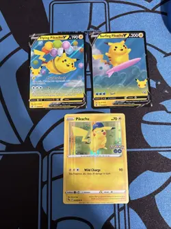 surfing pikachu v 008/025. Celebrations. Pokemon Go. Holo. Pikachu (3) - Image 1