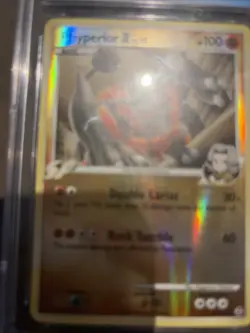 Pokemon 2009 Rhyperior Holo Card 32/111 Graded CGC 8.5 - Image 1