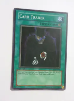 Card Trader STON-EN046 (Super Rare, 1st Edition, Moderately Played) - Image 1