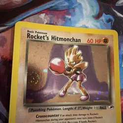 Pokemon TCG Rockets Hitmonchan Holo Rare Card 11/132 Gym Heroes Swirl NM - Image 1