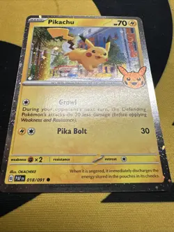 2024 Pokemon Pikachu Trick Or Trade Cosmos Holo Swirl by Tail and top right face - Image 1
