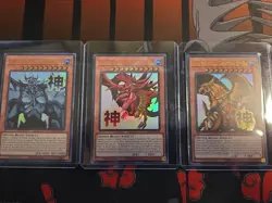 YUGIOH EGYPTIAN GOD SET SLIFER/OBELISK/RA STAMP ULTRA RARE RA05-EN128/129/130 - Image 1