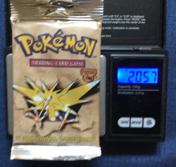1999 POKEMON,WOTC,FOSSIL BOOSTER PACK,FACTORY SEALED LONG CRIMP,20.57 gms - Image 1