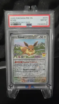 Pokemon TCG Eevee Pokemon Day 2025 PSA 8 - Image 1