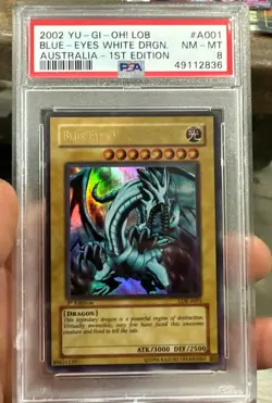 YUGIOH 2002 1st Edition BLUE-EYES WHITE DRAGON AUSTRALIAN LOB-#A001 PSA 8 - Image 1
