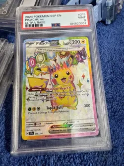 2024 Pokemon Surging Sparks Ultra Rare Pikachu Ex #219 PSA 9 - Image 1