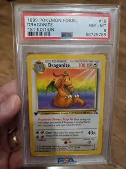 DRAGONITE 1999 POKEMON FOSSIL 1ST EDITION #19/62 PSA 8 - Image 1