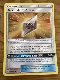 Normalium Z Trainer Pokemon Card 203/236 R/Holo- Used -Sun & Moon-Unified Minds - Image 1