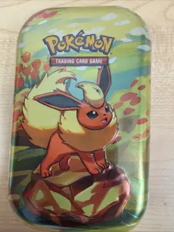 Pokemon Prismatic Evolutions Mini Tin Evee FLAREON New Sealed - Image 1