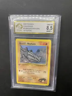 Brock's Rhyhorn 70/132 1st Edition Gym Heroes Pokemon Card CGA 8.5 - Image 1