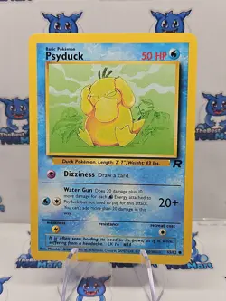 Psyduck 65/82 Team Rocket Pokemon MP - Image 1