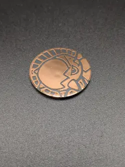 Pokemon Cranidos Coin Bronze Holo TCG Official Vintage Pre Owned - Image 1