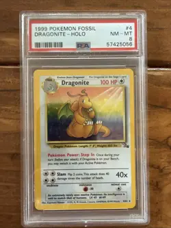 1999 Pokemon Fossil Dragonite 4/62 Holo PSA 8 - Image 1