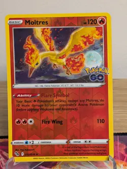 MOLTRES 012/078 HOLO RARE POKEMON GO POKEMON REVERSE HOLO NM - Image 1
