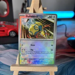 Pokemon TCG Dunsparce Reverse Holo Pokeball Prismatic Evolutions Card 079/131 - Image 1