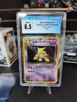 1997 POKEMON ROCKET GANG HOLO JPN #065 DARK ALAKAZAM CGC 8.5 - Image 1