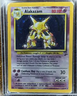 NEW 1995 BASE SET POKEMON HOLO CARD #1 of 102 "ALAKAZAM" - Image 1