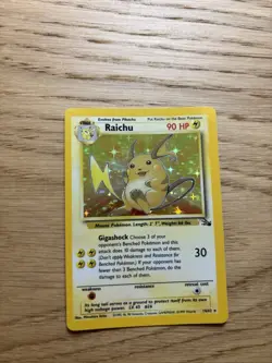 Authentic Raichu Holo Rare from the 1999 Pokemon Fossil set, card #14/62. - Image 1